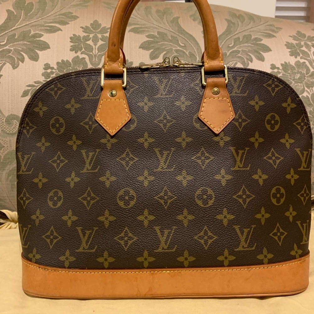 Sold Authentic Louis Vuitton Alma Pm